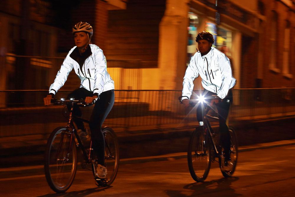 Two cyclists in the dark