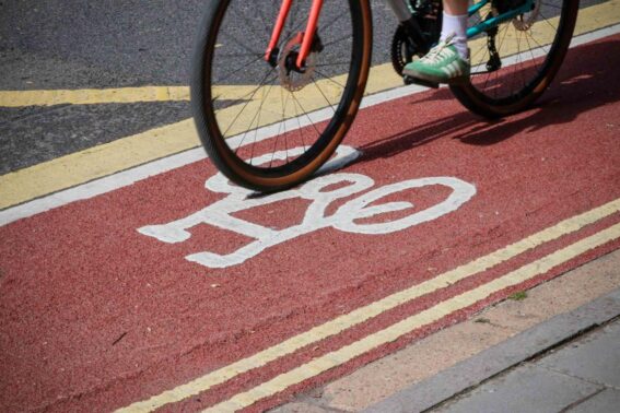 Image of bicycle wheel on a cycle lane