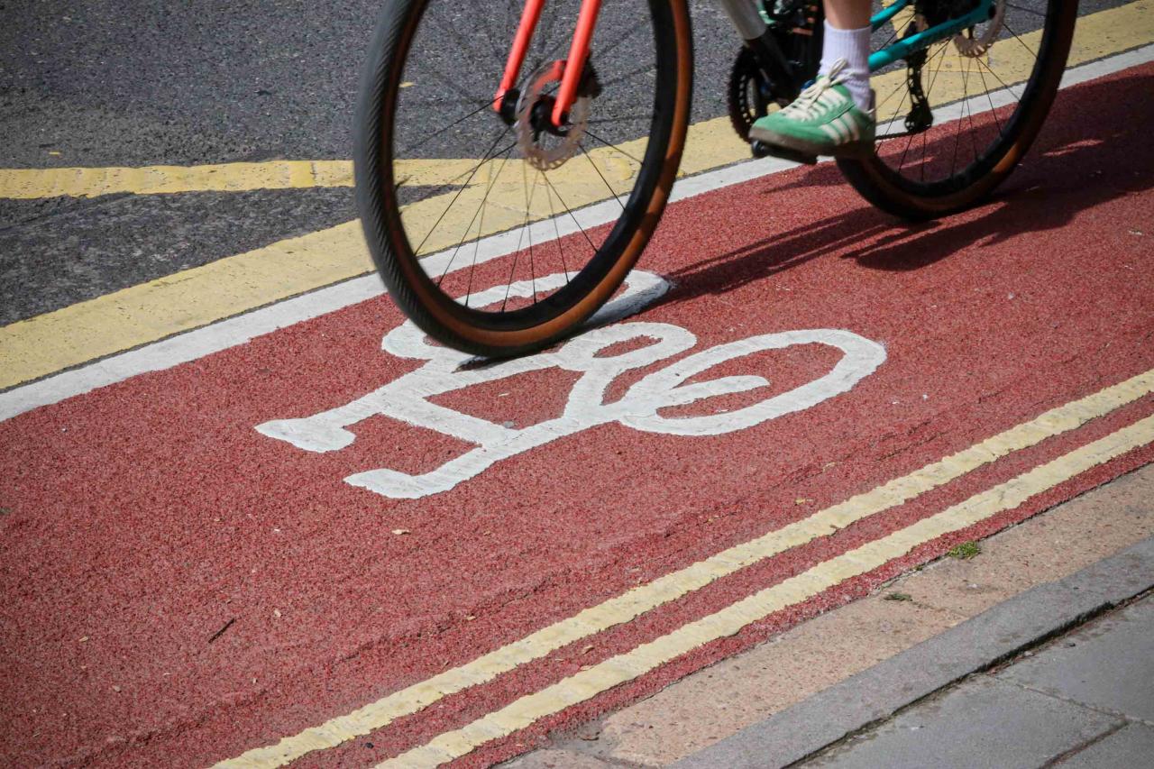 Image of bicycle wheel on a cycle lane